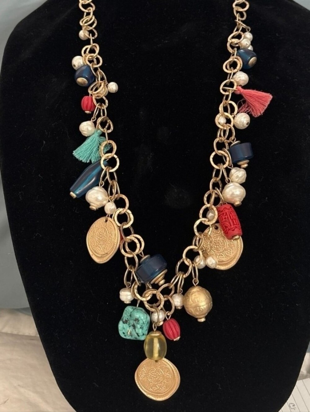 eclectic, bohemian-style charm Statement necklace a chunky gold-toned Chain